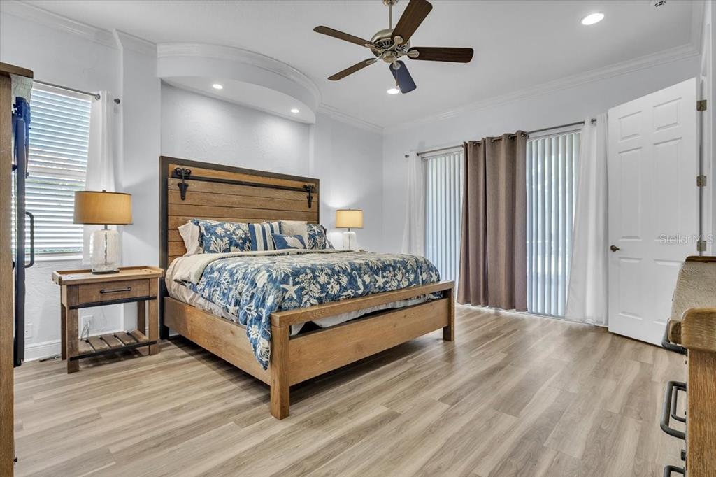 709 Country Meadows Way Bradenton, FL 34212 - Photo 41 of 97 a bedroom with a bed and window