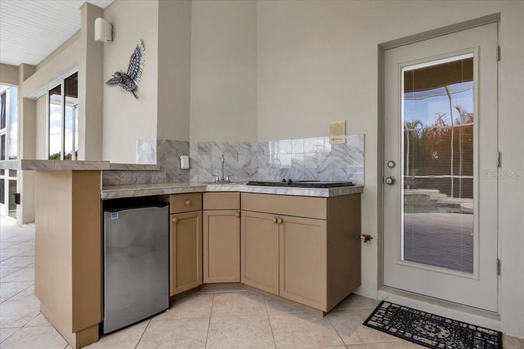 709 Country Meadows Way Bradenton, FL 34212 - Photo 69 of 97 a bathroom with a granite countertop sink and a mirror