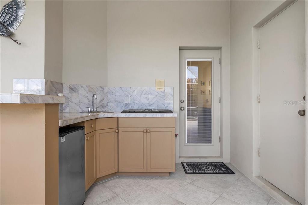 709 Country Meadows Way Bradenton, FL 34212 - Photo 70 of 97 a bathroom with a granite countertop sink and a mirror