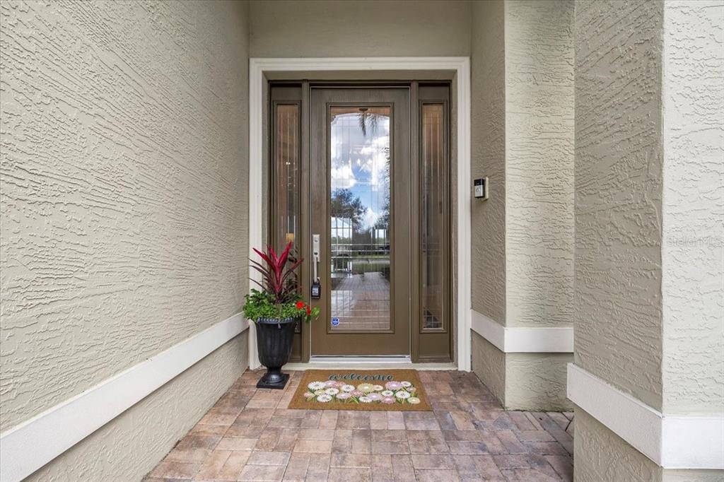 709 Country Meadows Way Bradenton, FL 34212 - Photo 7 of 97 a view of a entryway door of the house