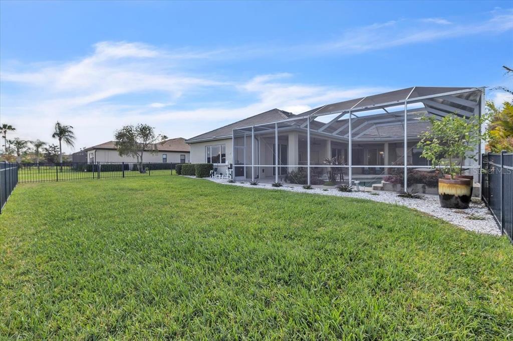 709 Country Meadows Way Bradenton, FL 34212 - Photo 79 of 97 a view of a house with backyard and porch