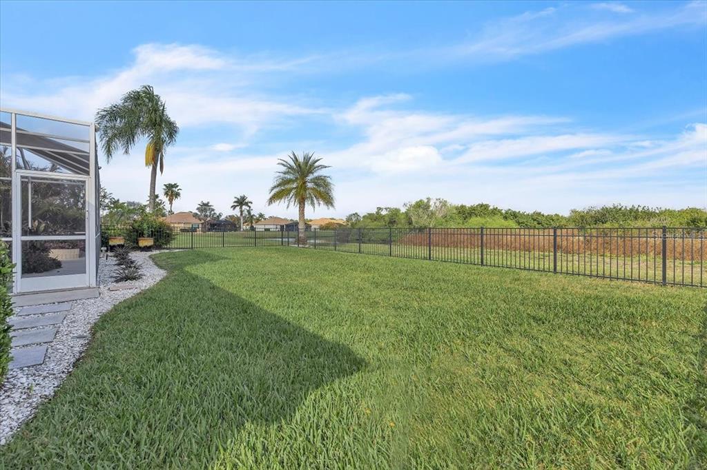 709 Country Meadows Way Bradenton, FL 34212 - Photo 81 of 97 a view of a garden with a lake view