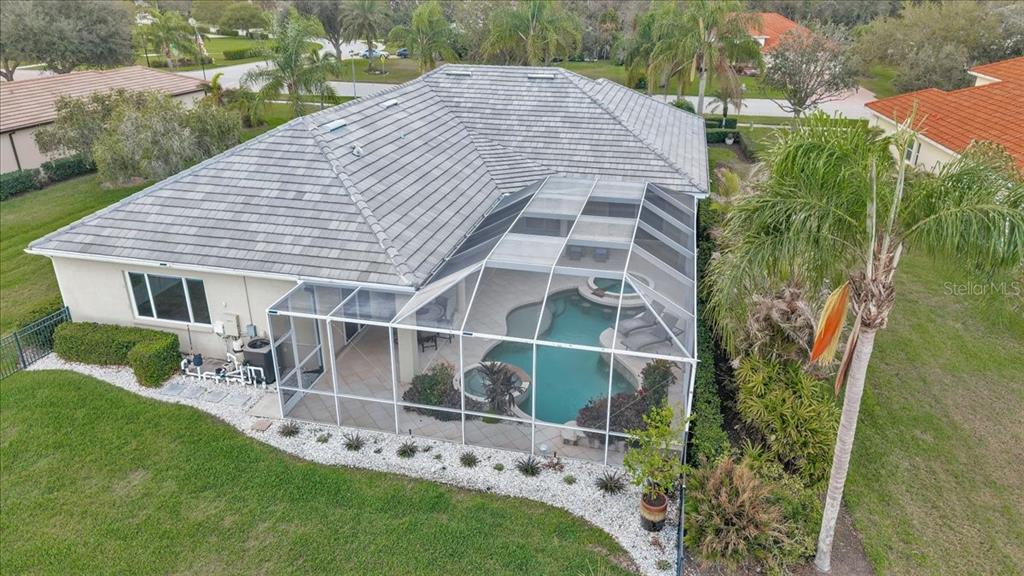 709 Country Meadows Way Bradenton, FL 34212 - Photo 83 of 97 a aerial view of a house with a yard and sitting area