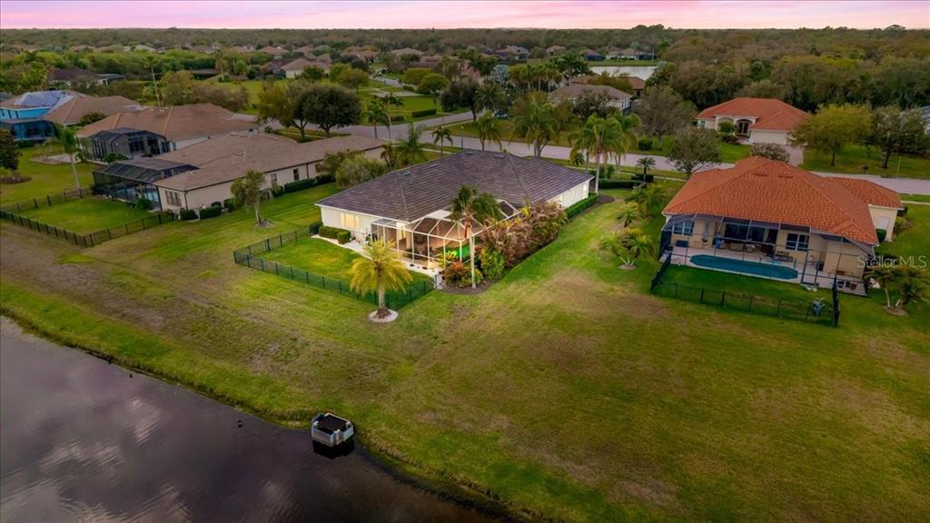 709 Country Meadows Way Bradenton, FL 34212 - Photo 84 of 97 an aerial view of a house with garden space and street view