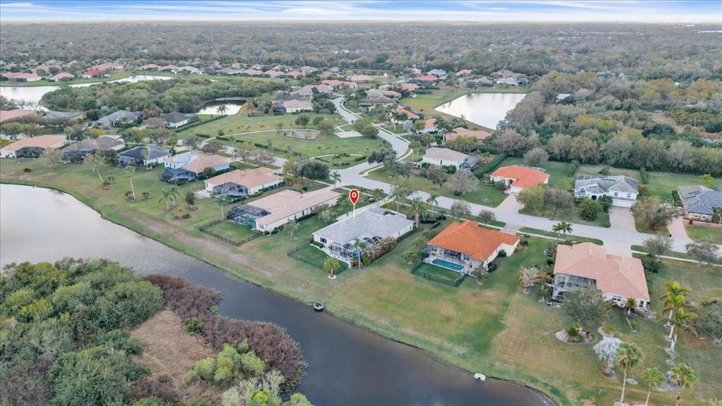 709 Country Meadows Way Bradenton, FL 34212 - Photo 85 of 97 an aerial view of residential houses with outdoor space