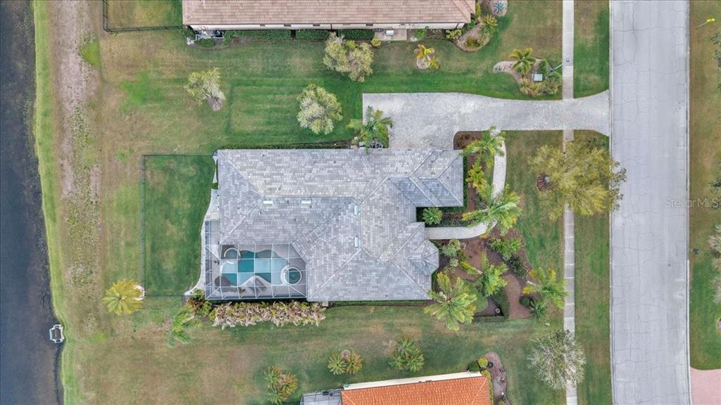 709 Country Meadows Way Bradenton, FL 34212 - Photo 89 of 97 an aerial view of a house with a yard
