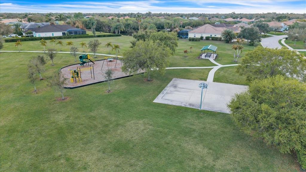 709 Country Meadows Way Bradenton, FL 34212 - Photo 94 of 97 an aerial view of a house with a garden