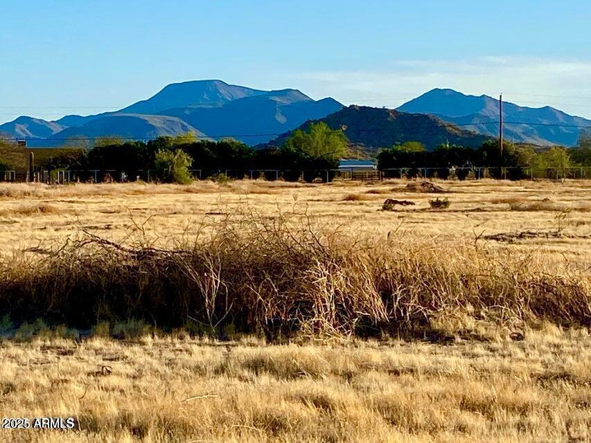 0 Huisatch Road, Unit 19 Maricopa, AZ 85139 - Photo 17 of 29 a view of lake with mountain