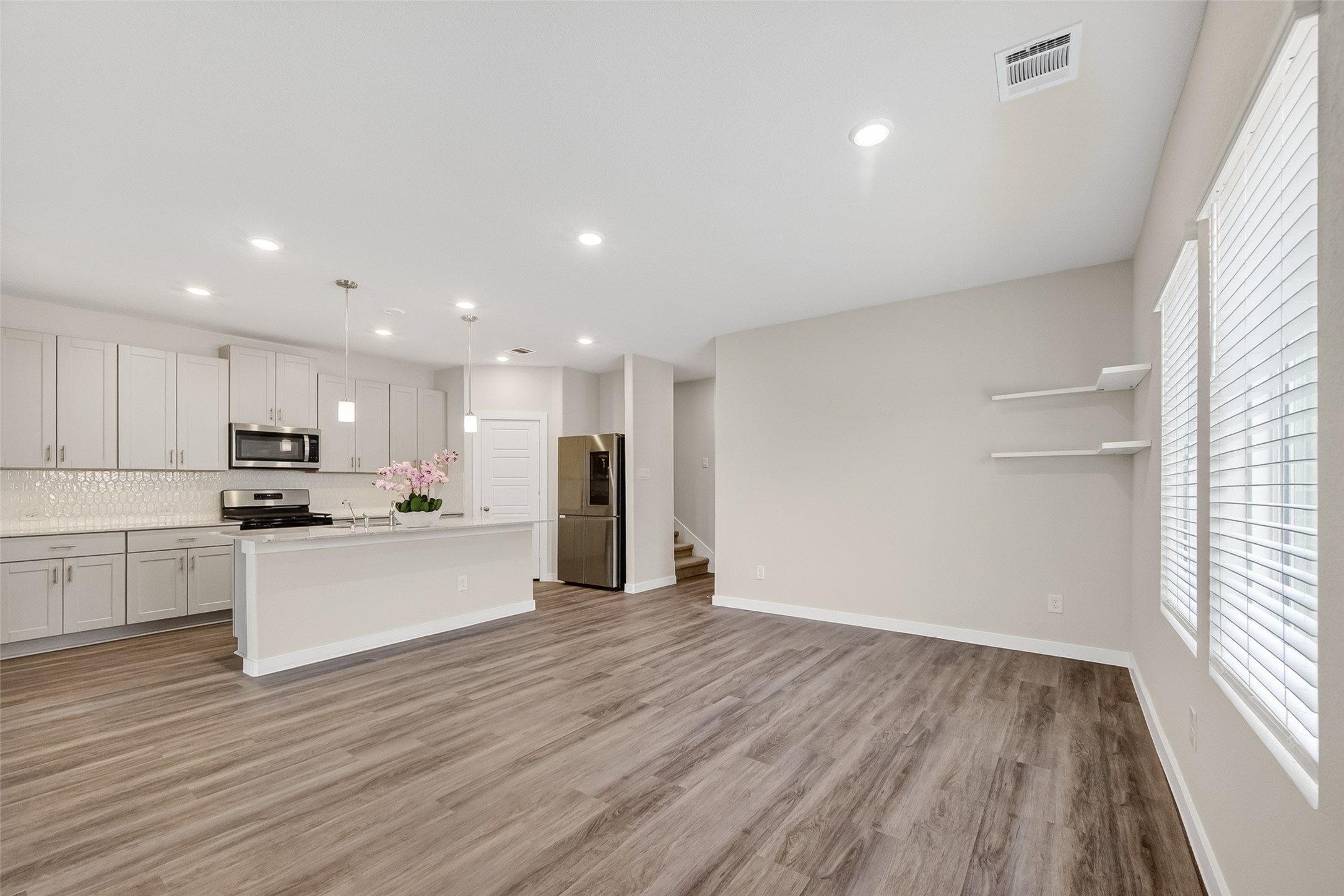12119 Rushing Rdg Drive Baytown, TX 77523 - Photo 12 of 48 a view of kitchen with wooden floor
