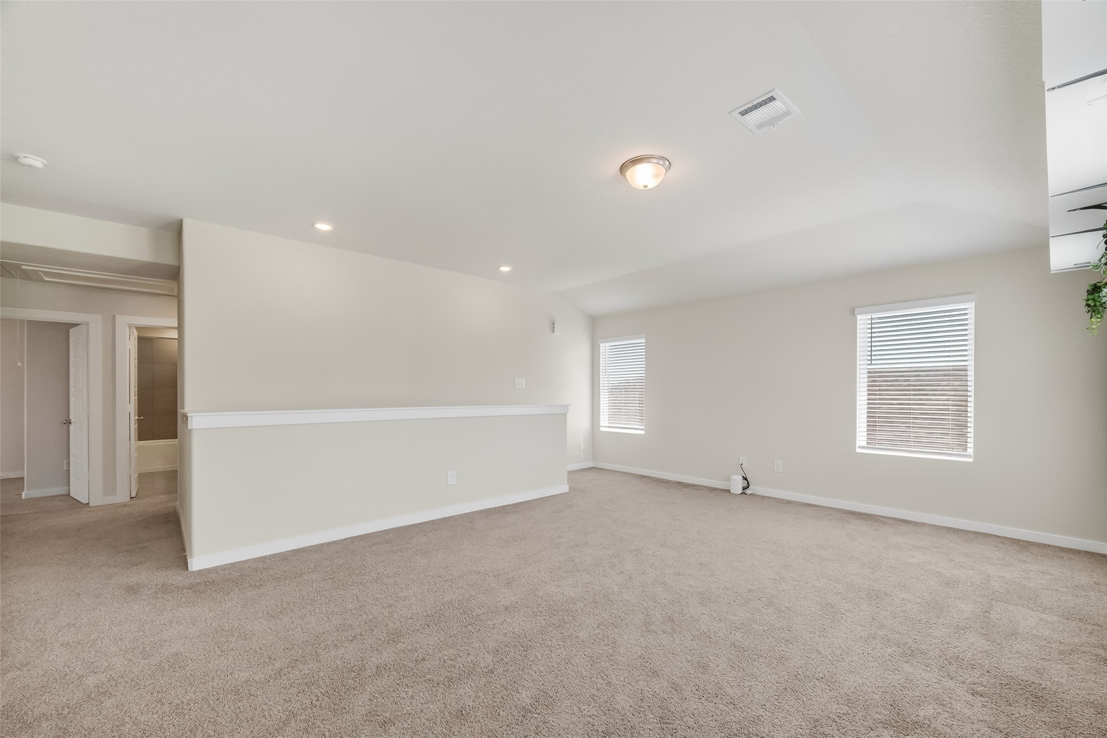 12119 Rushing Rdg Drive Baytown, TX 77523 - Photo 20 of 48 an empty room with windows