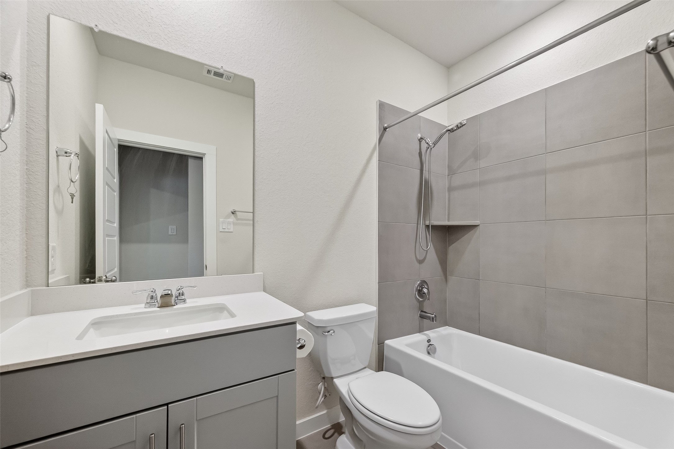 12119 Rushing Rdg Drive Baytown, TX 77523 - Photo 24 of 48 a bathroom with a sink toilet and shower