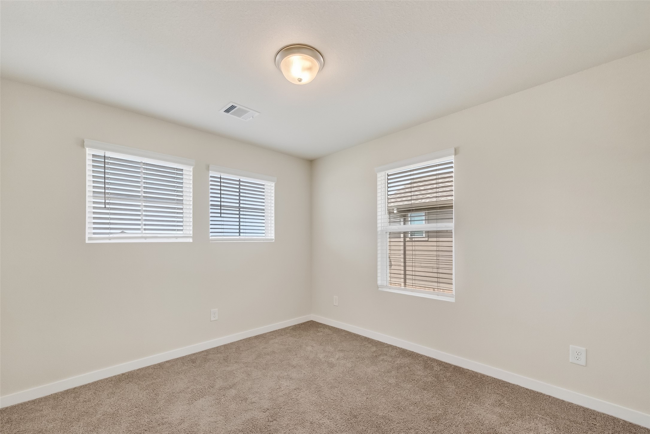 12119 Rushing Rdg Drive Baytown, TX 77523 - Photo 25 of 48 a view of an empty room with a window