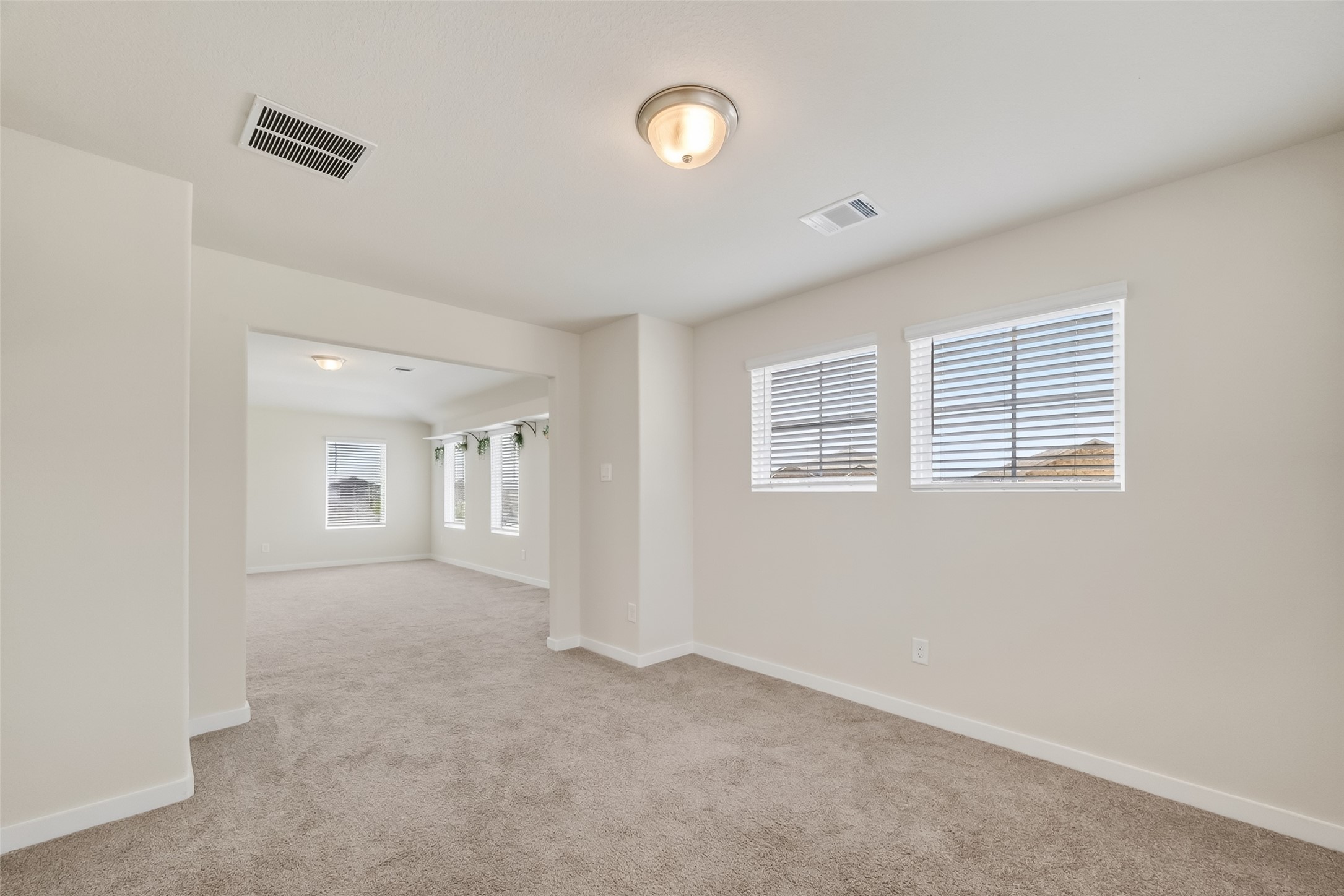 12119 Rushing Rdg Drive Baytown, TX 77523 - Photo 26 of 48 a view of an empty room with a window