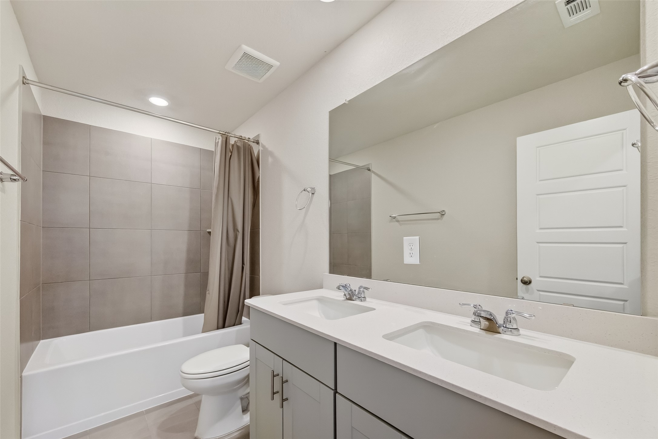 12119 Rushing Rdg Drive Baytown, TX 77523 - Photo 27 of 48 a bathroom with a sink a toilet and shower