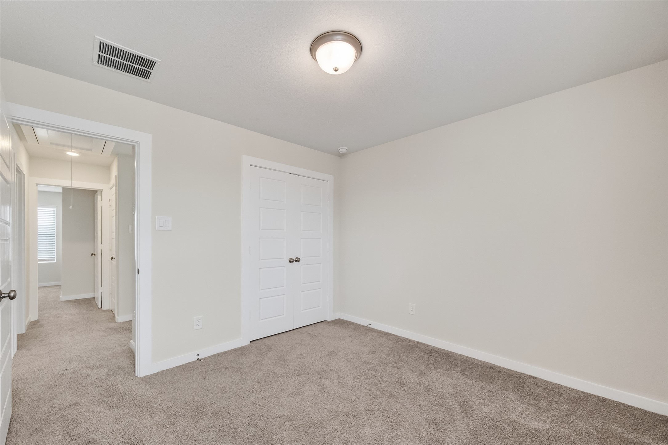 12119 Rushing Rdg Drive Baytown, TX 77523 - Photo 28 of 48 an empty room with a door