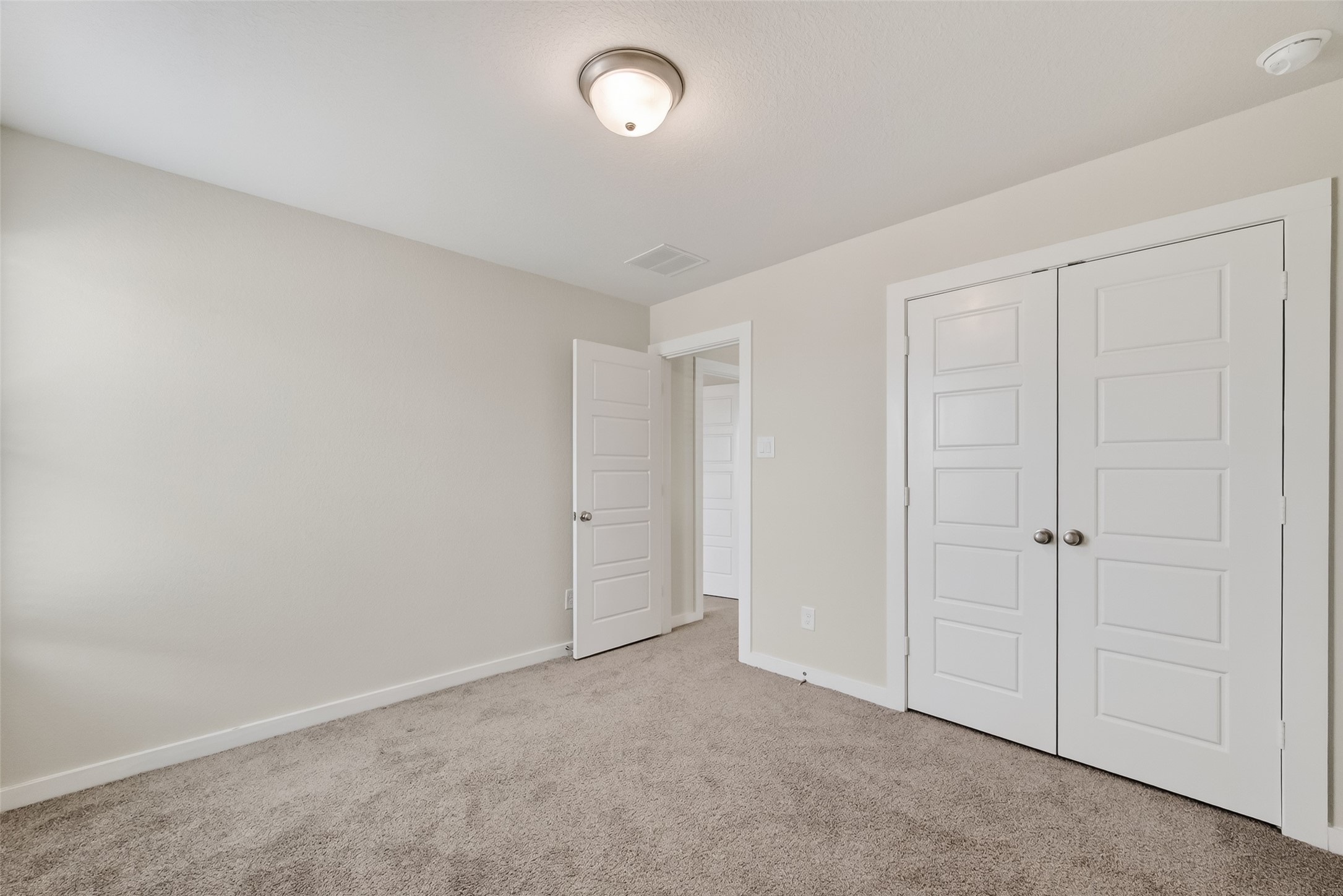 12119 Rushing Rdg Drive Baytown, TX 77523 - Photo 29 of 48 an empty room with closet area