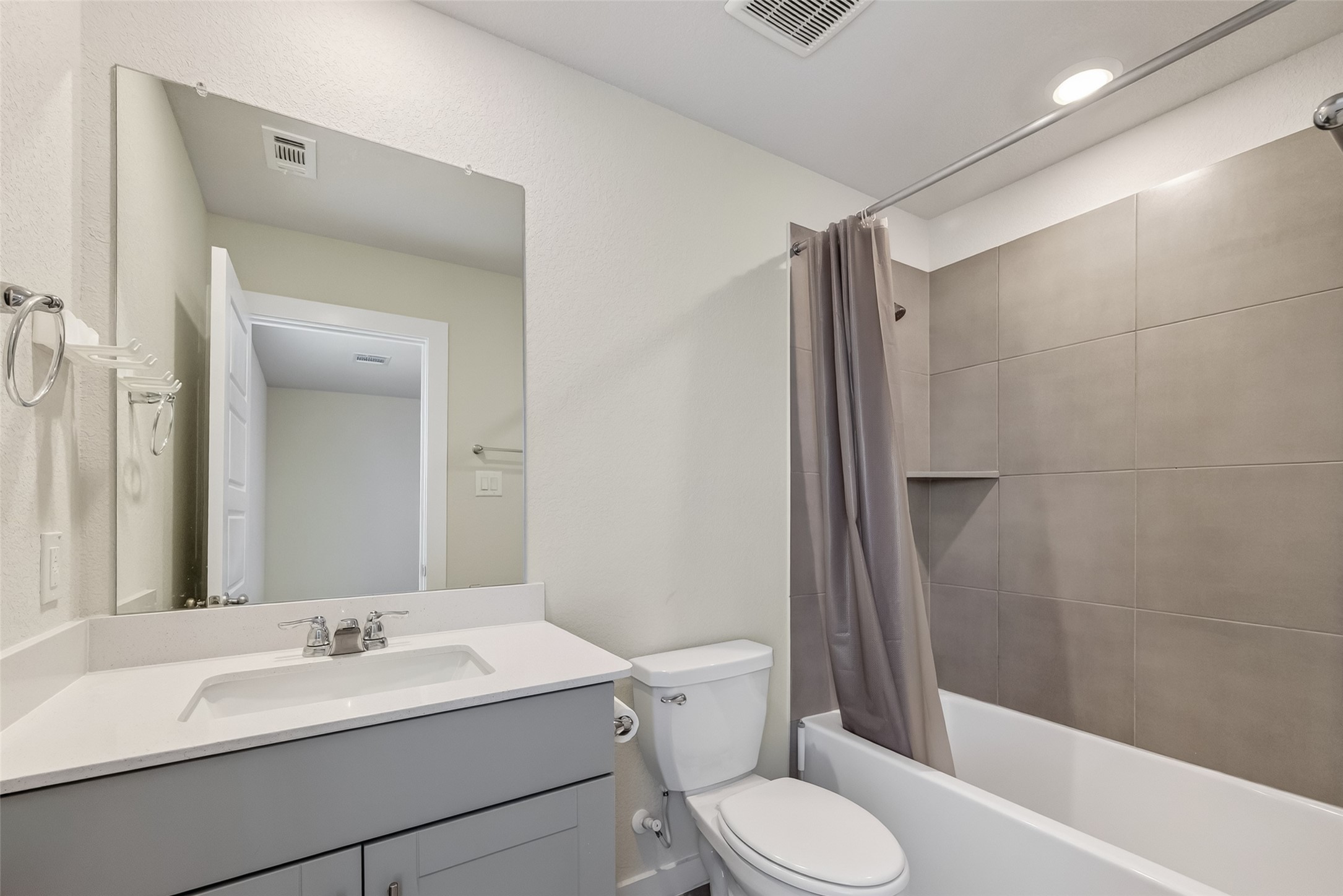 12119 Rushing Rdg Drive Baytown, TX 77523 - Photo 36 of 48 a bathroom with a sink toilet and shower