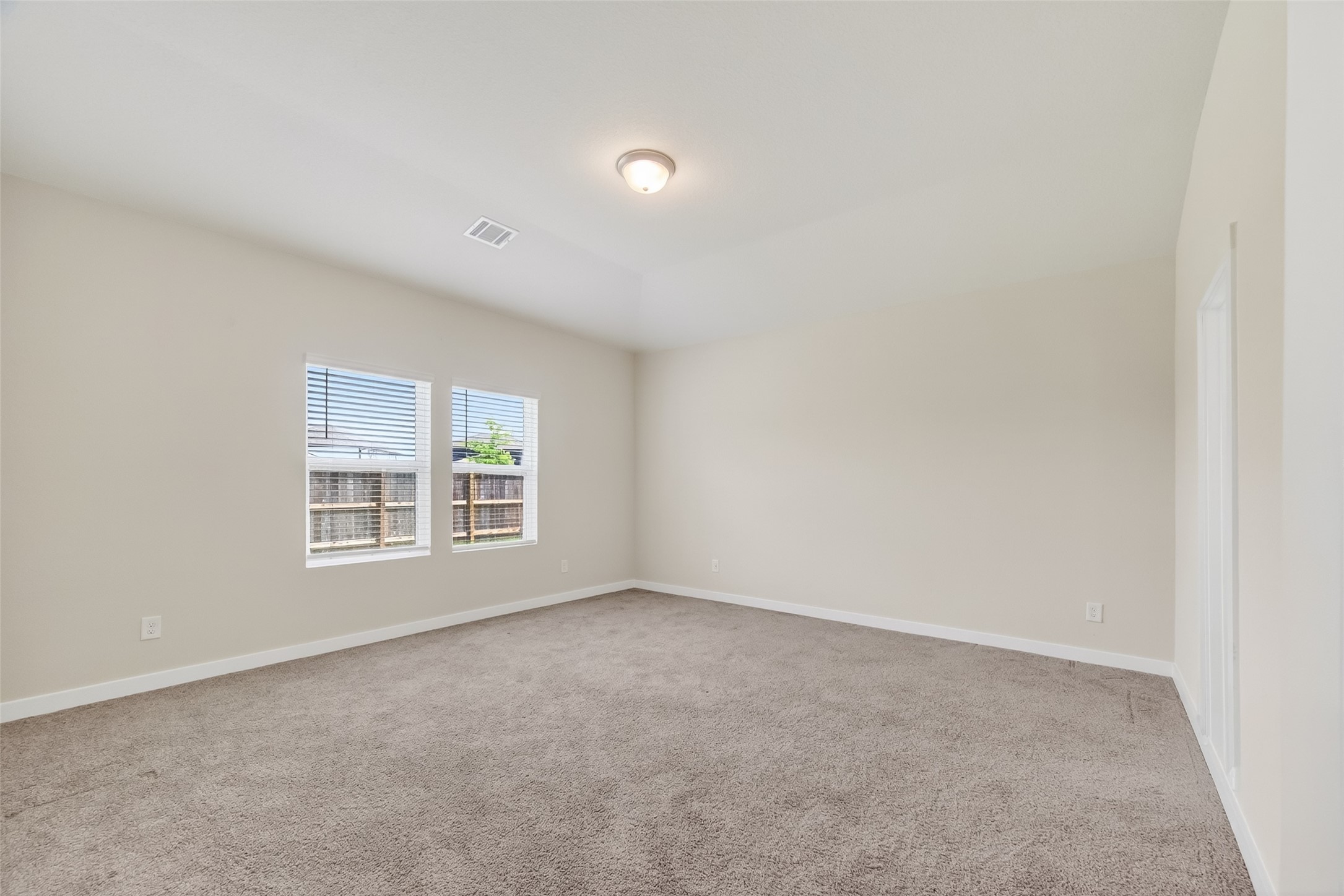 12119 Rushing Rdg Drive Baytown, TX 77523 - Photo 37 of 48 a view of an empty room with a window