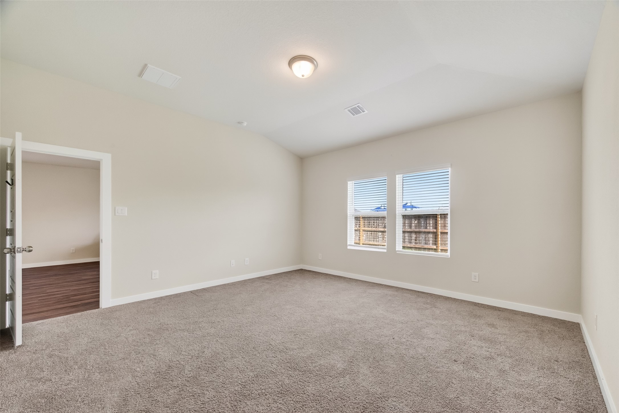 12119 Rushing Rdg Drive Baytown, TX 77523 - Photo 38 of 48 an empty room with a window