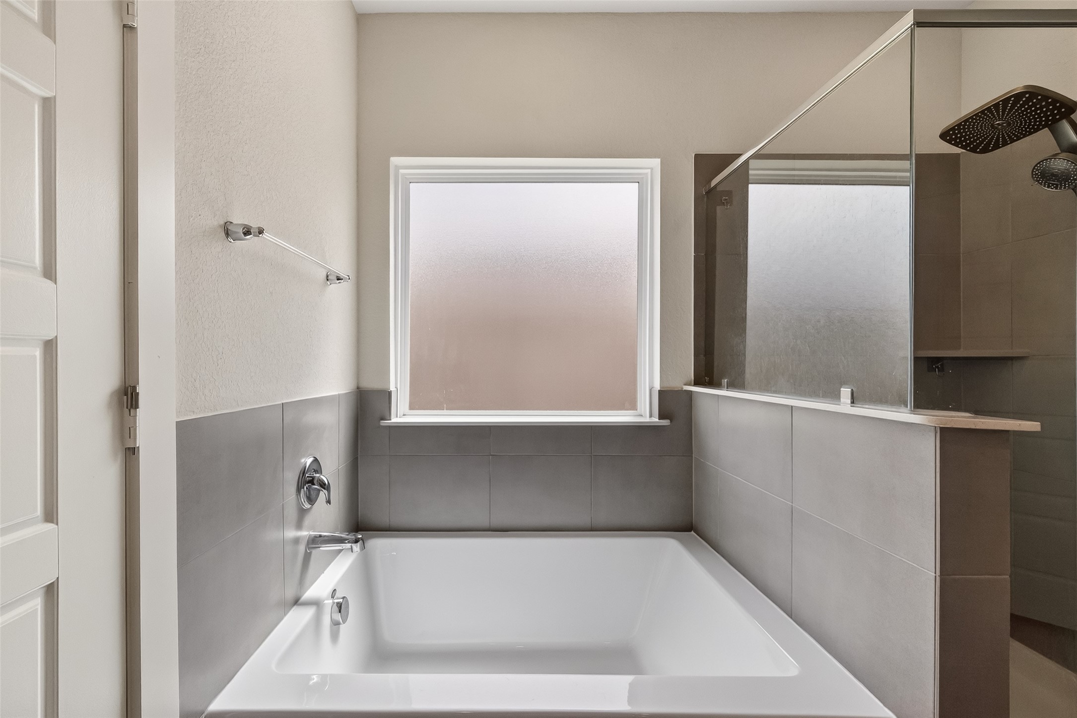 12119 Rushing Rdg Drive Baytown, TX 77523 - Photo 41 of 48 a bathroom with a tub and shower