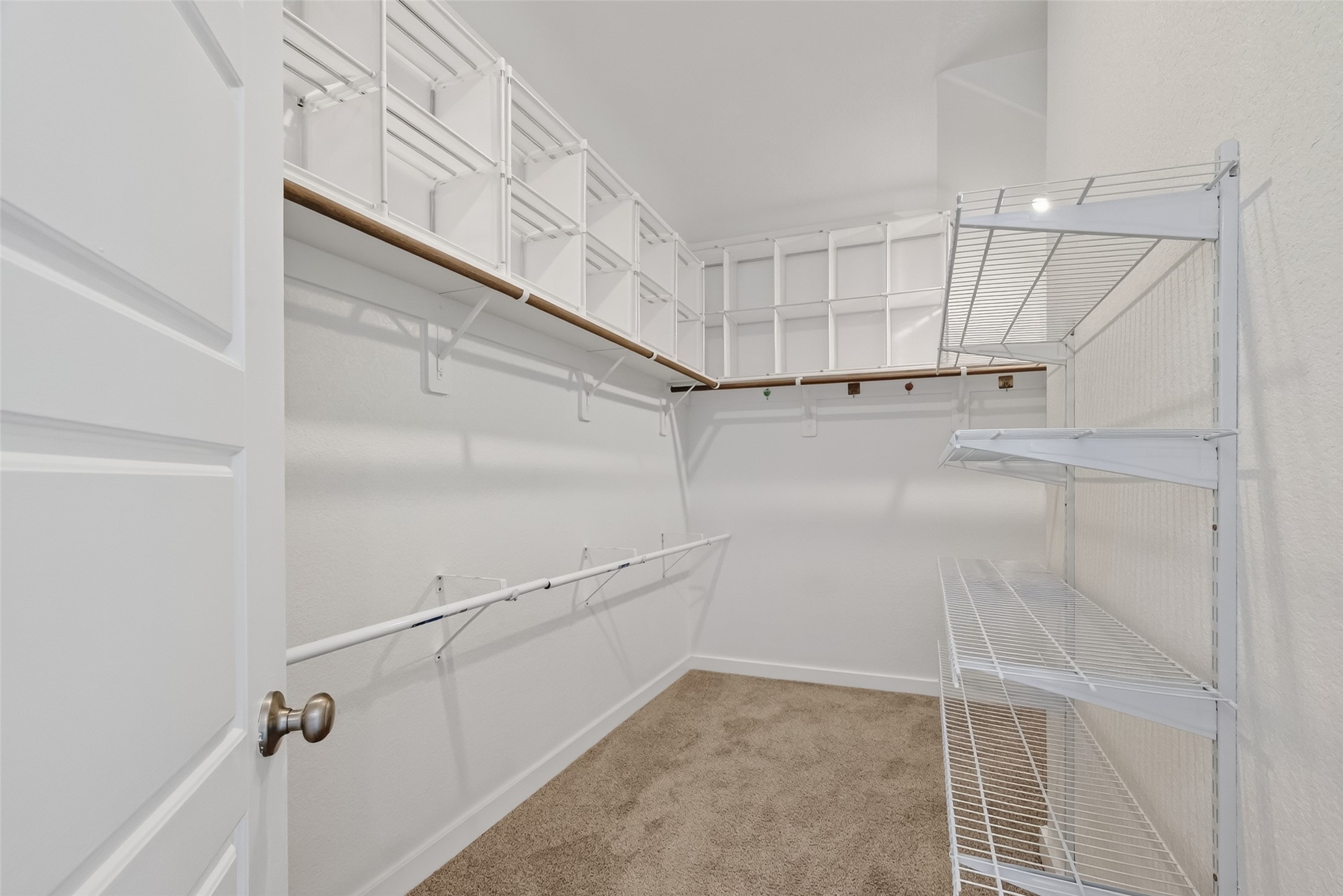 12119 Rushing Rdg Drive Baytown, TX 77523 - Photo 43 of 48 a view of a room with racks on the wall