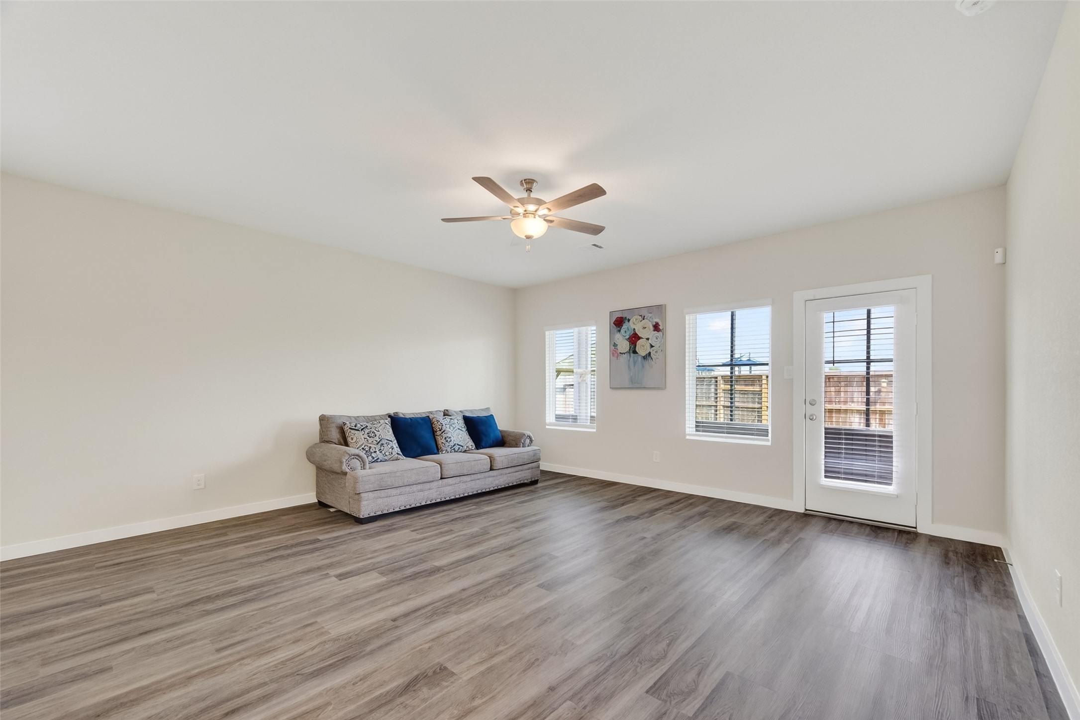 12119 Rushing Rdg Drive Baytown, TX 77523 - Photo 7 of 48 a living room with furniture and wooden floor