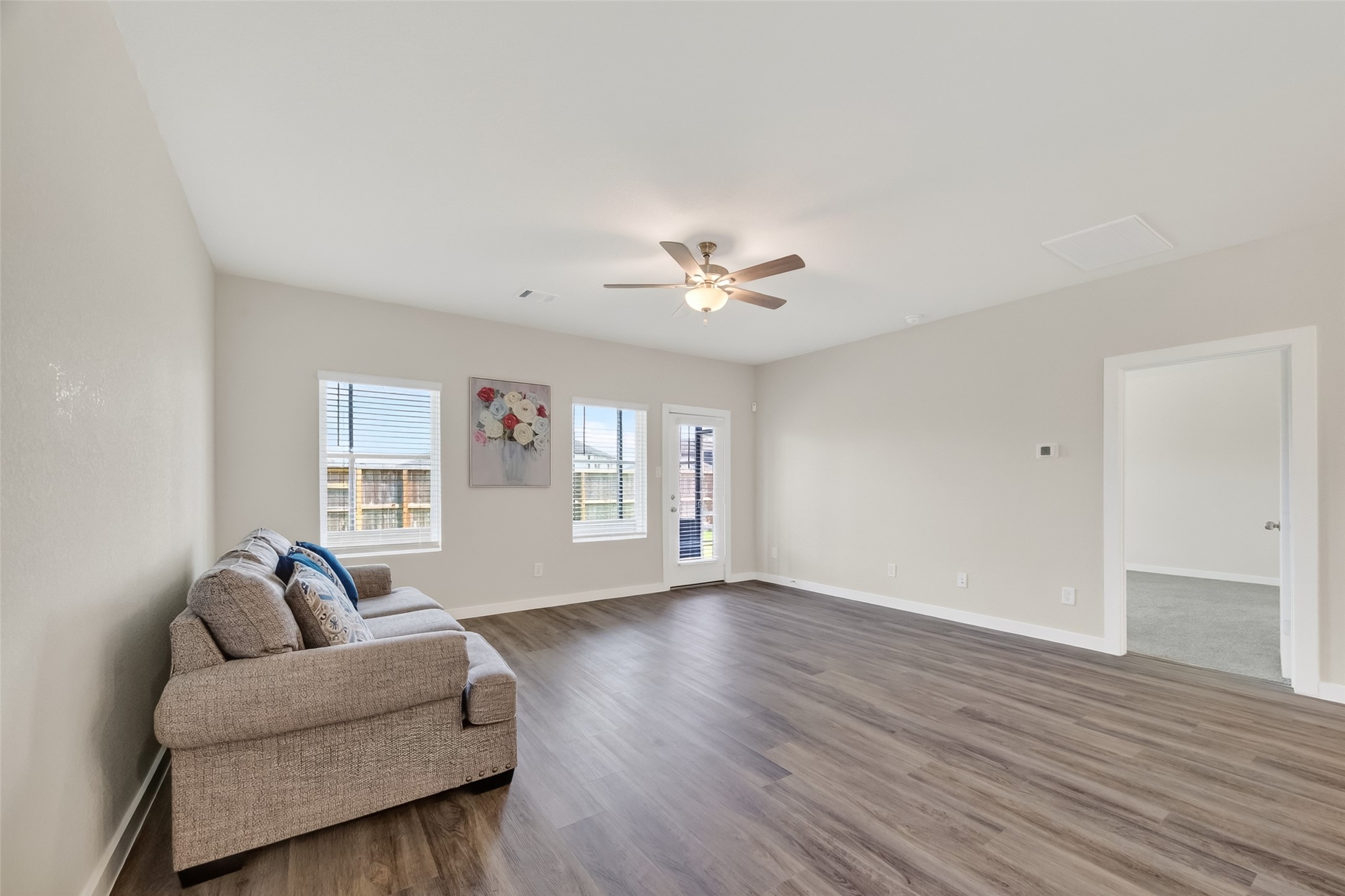 12119 Rushing Rdg Drive Baytown, TX 77523 - Photo 10 of 48 a living room with furniture and a large window