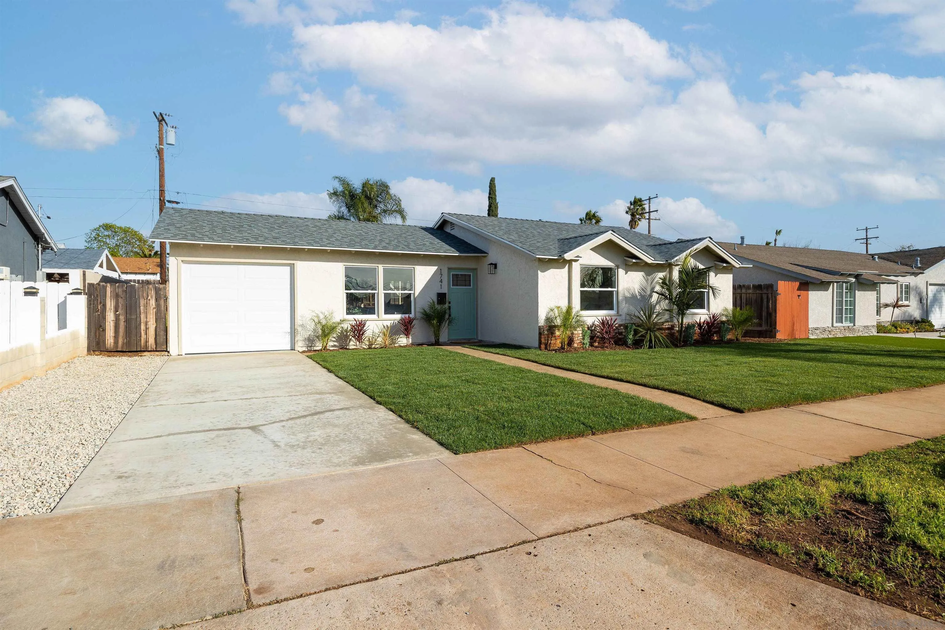 1741 Burnet Street El Cajon, CA 92021 - Photo 1 of 1 a front view of a house with a yard