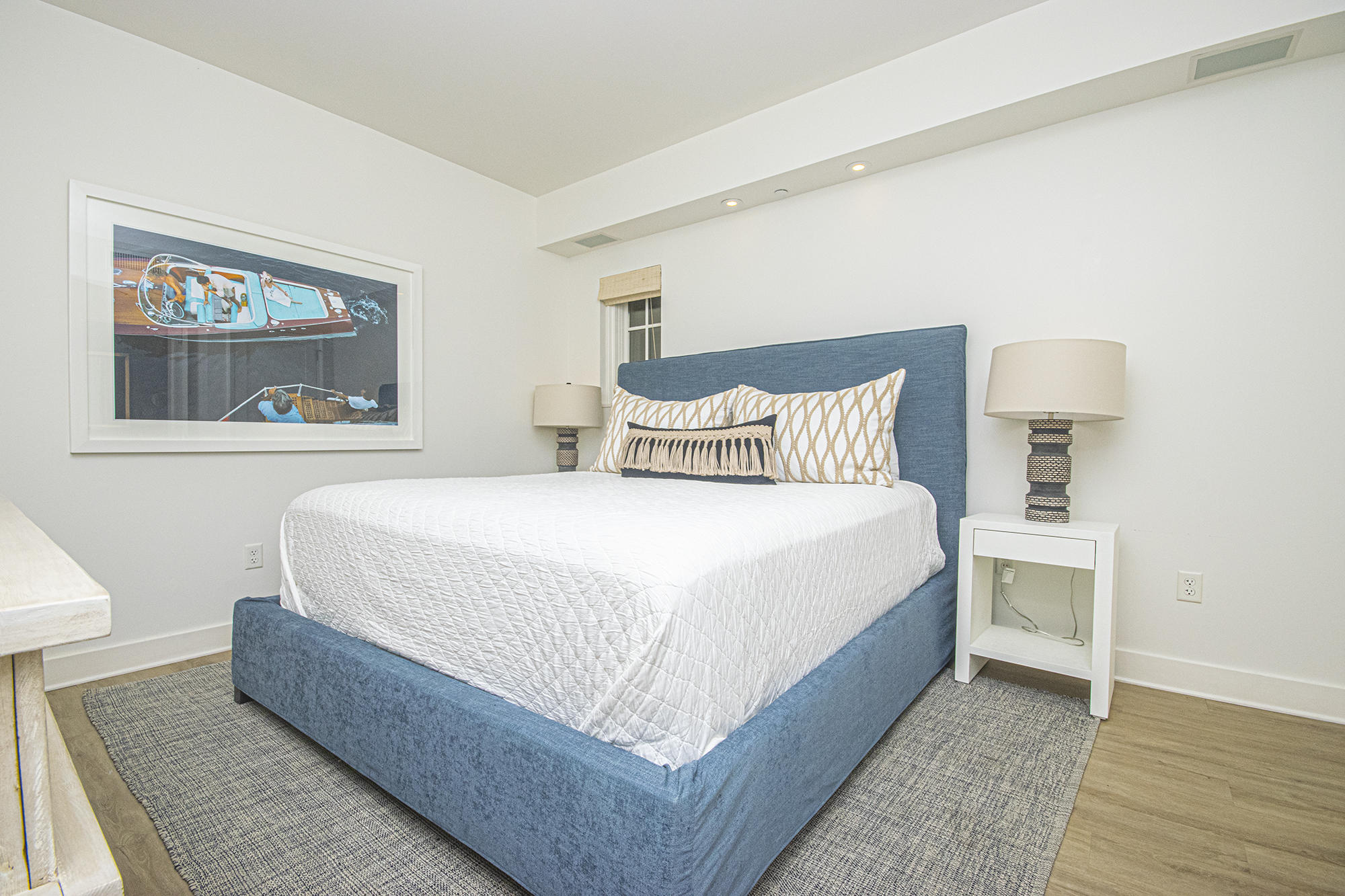 136 Georgetown Avenue, Unit A16 Inlet Beach, FL 32461 - Photo 32 of 57 a bedroom with a bed and wooden floor