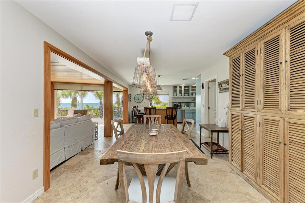 8320 Manasota Key Road Englewood, FL 34223 - Photo 15 of 58 a view of a dining room with furniture window and outside view