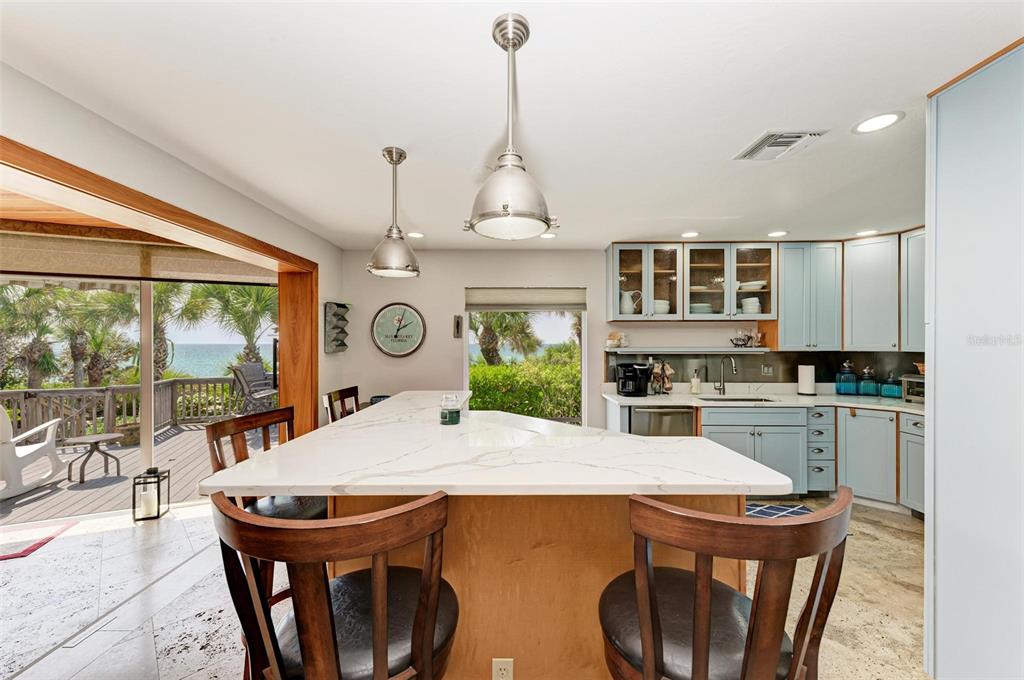 8320 Manasota Key Road Englewood, FL 34223 - Photo 18 of 58 a view of a dining room with furniture window and outside view