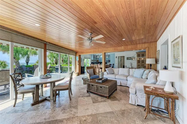 a view of a chairs and tables in the balcony