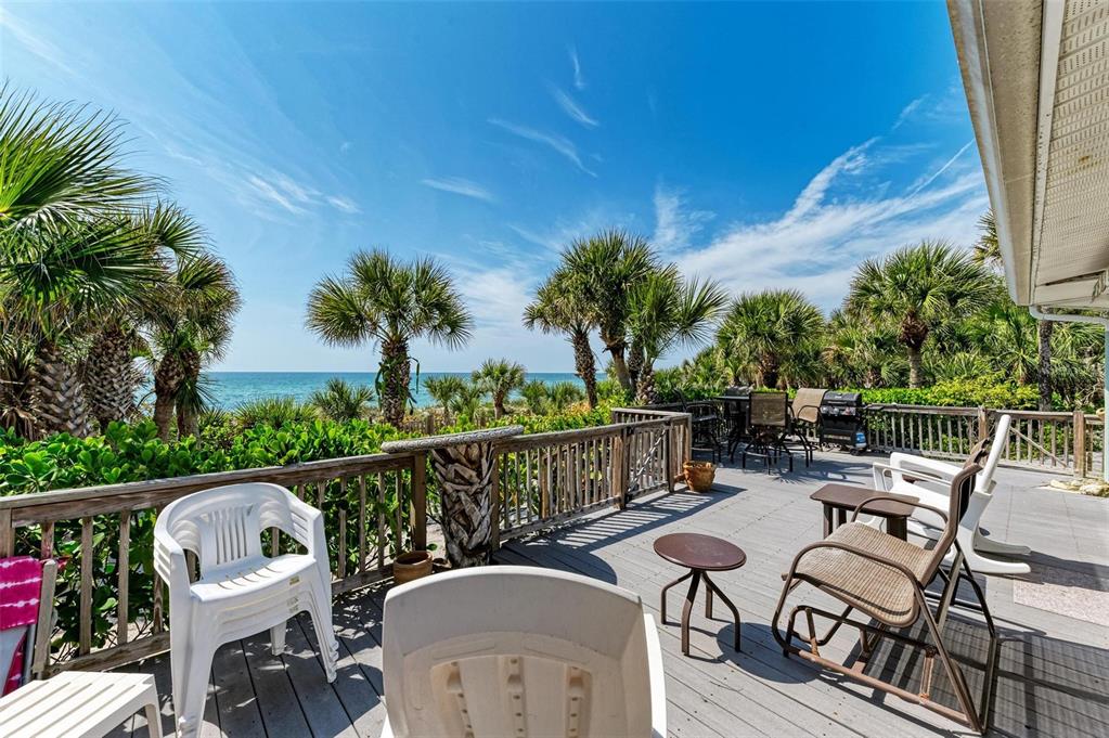 8320 Manasota Key Road Englewood, FL 34223 - Photo 44 of 58 a view of a chairs and tables in the balcony