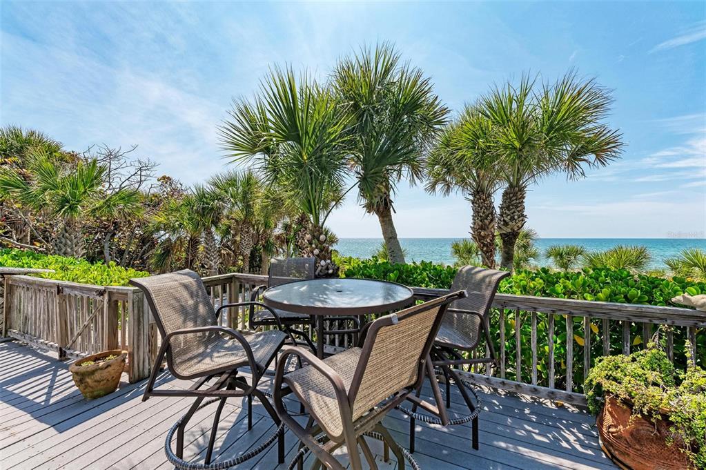 8320 Manasota Key Road Englewood, FL 34223 - Photo 47 of 58 a view of a table and chairs in patio