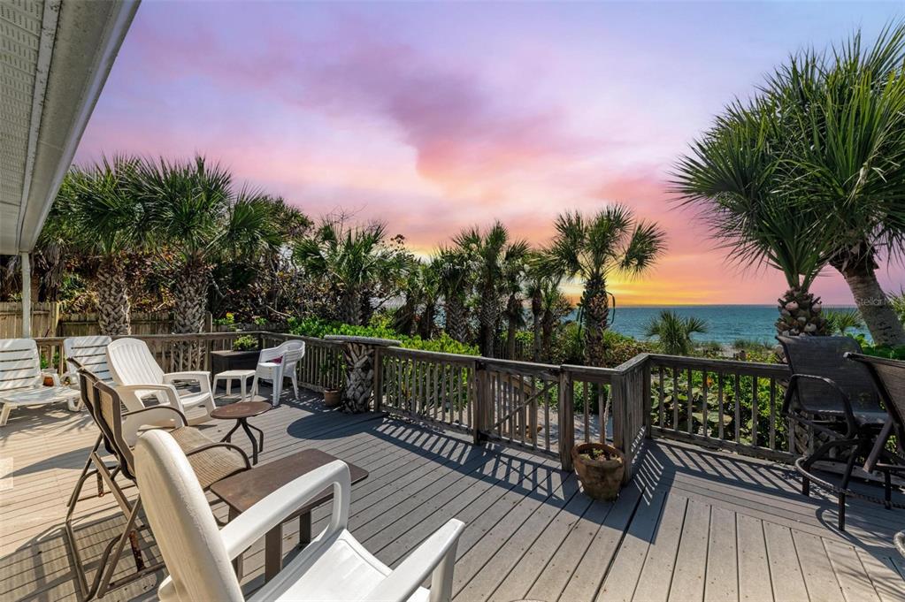 8320 Manasota Key Road Englewood, FL 34223 - Photo 56 of 58 a view of balcony with furniture and wooden floor
