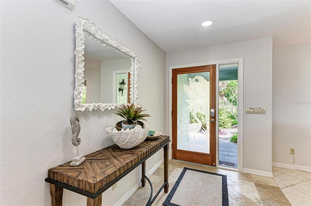 8320 Manasota Key Road Englewood, FL 34223 - Photo 8 of 58 a view of a livingroom with furniture