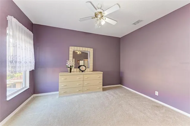 a bathroom with a bathtub shower and a sink