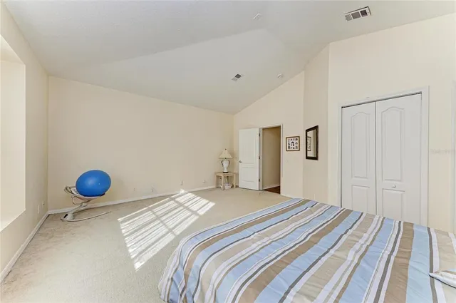 a view of a backyard with swimming pool