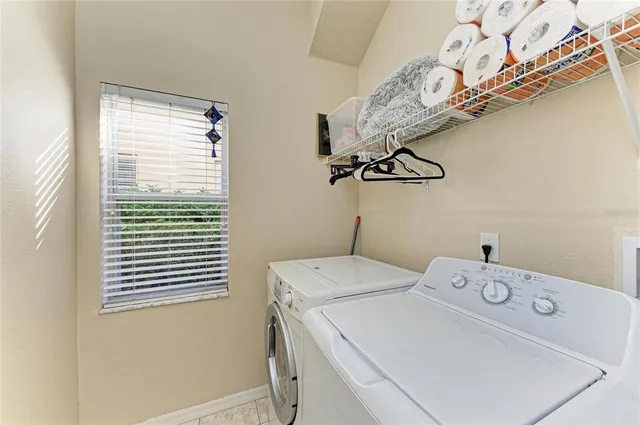 an aerial view of residential house with outdoor space
