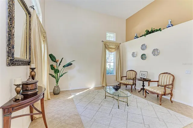 a living room with furniture and a table