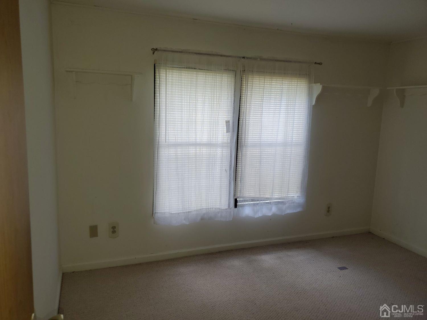 35 Dickens Road North Brunswick, NJ 08902 - Photo 12 of 15 an empty room with a window
