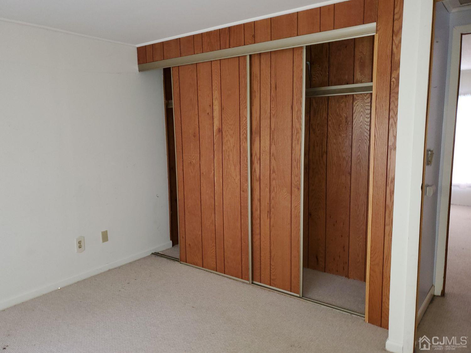 35 Dickens Road North Brunswick, NJ 08902 - Photo 14 of 15 a view of an empty room with sliding door