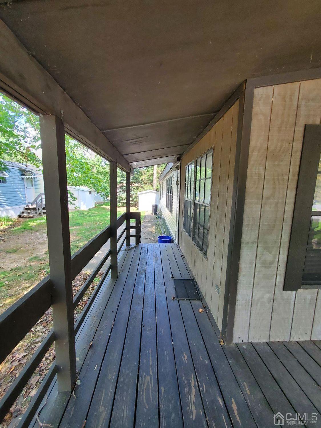 35 Dickens Road North Brunswick, NJ 08902 - Photo 4 of 15 a view of balcony with wooden floor