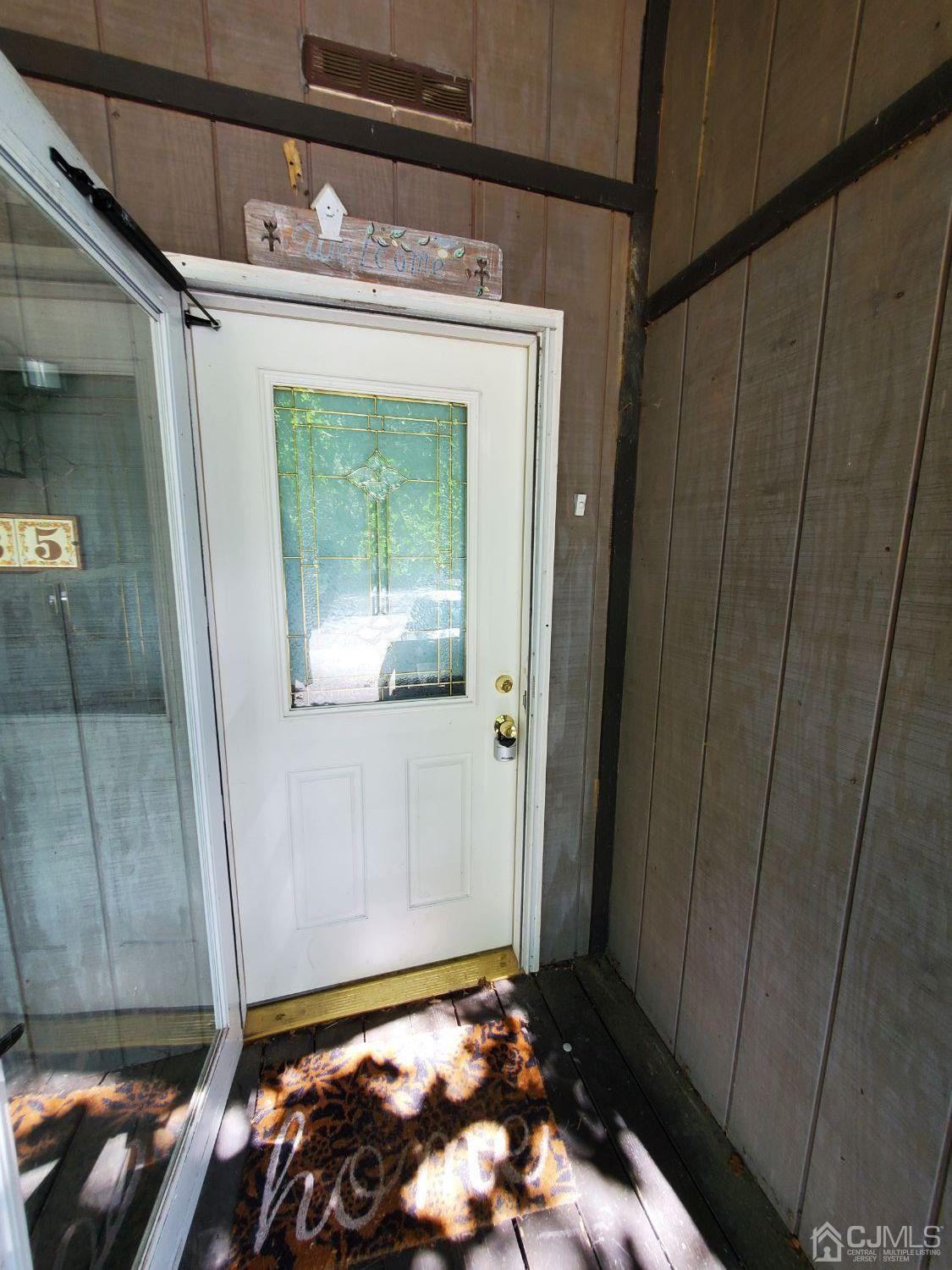 35 Dickens Road North Brunswick, NJ 08902 - Photo 5 of 15 a room with water heater and wooden cabinets
