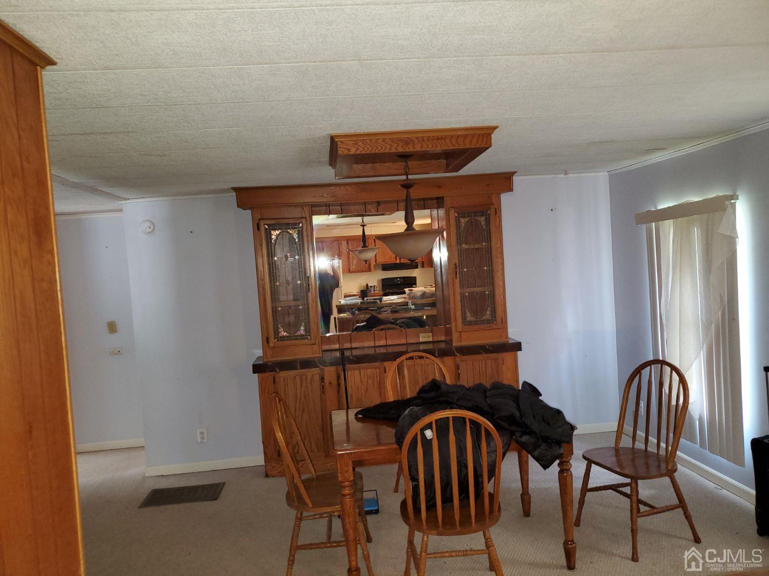 35 Dickens Road North Brunswick, NJ 08902 - Photo 7 of 15 a dining room with furniture and window