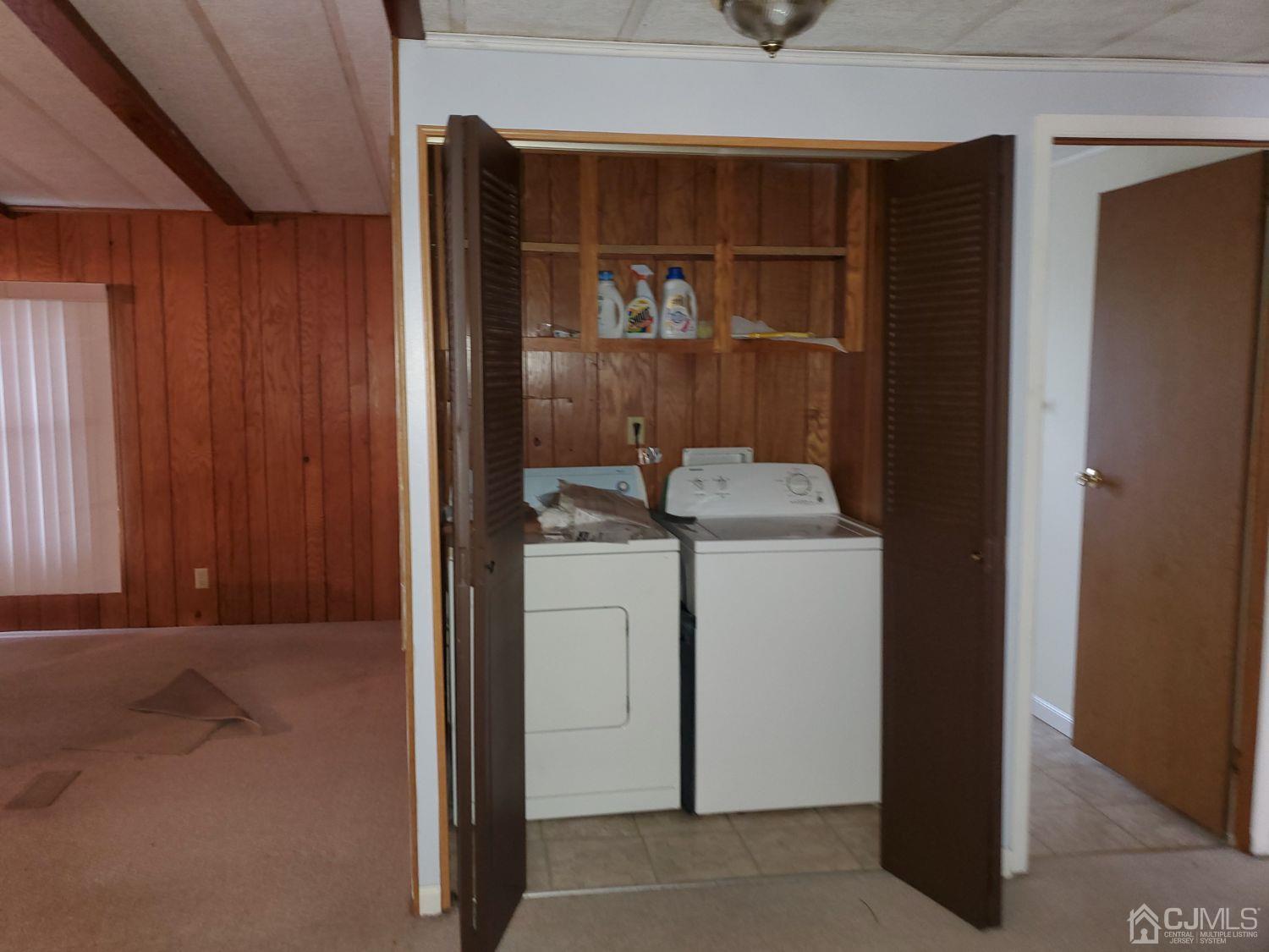 35 Dickens Road North Brunswick, NJ 08902 - Photo 8 of 15 a utility room with dryer and washer