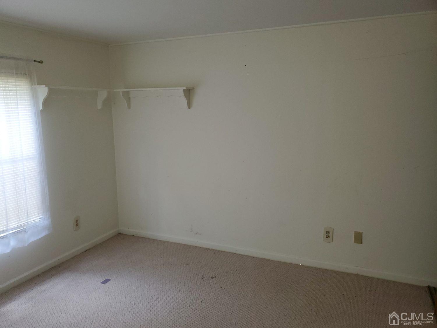 35 Dickens Road North Brunswick, NJ 08902 - Photo 10 of 15 a room that has a window in it