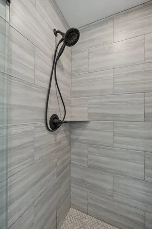 a view of a workspace with furniture and wooden floor