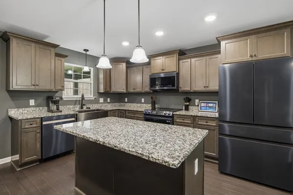 a bed room with a bed and a window