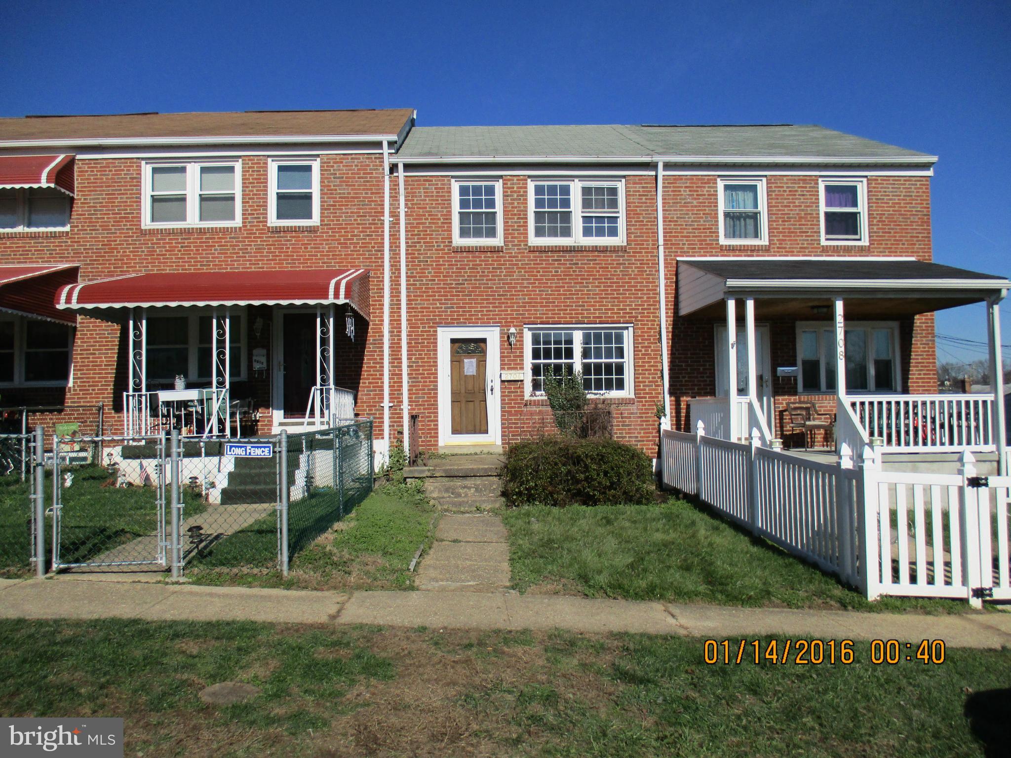 2706 Norfen Road Baltimore, MD 21227 - Photo 1 of 10 a view of house with a patio and a yard
